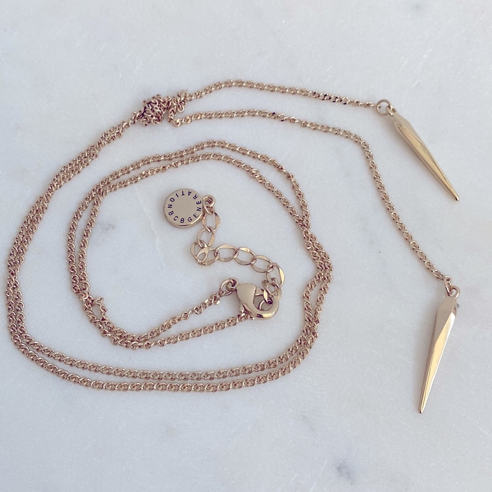 BCBGeneration Knotted Long Length Lariat Gold Tone Tassels Necklace EUC